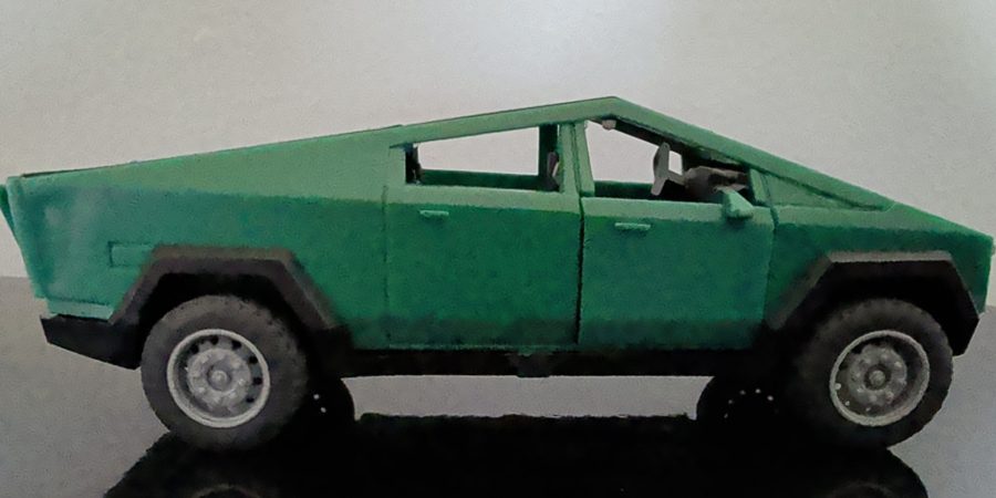 A green toy Cybertruck