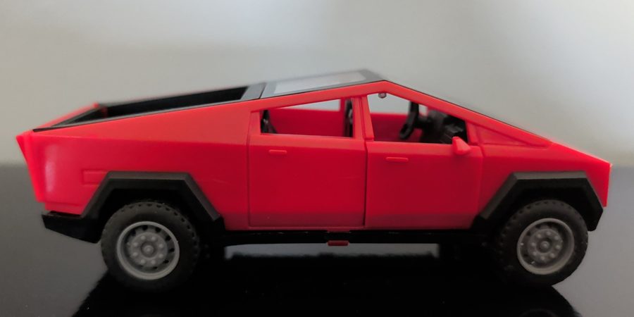A red toy Cybertruck